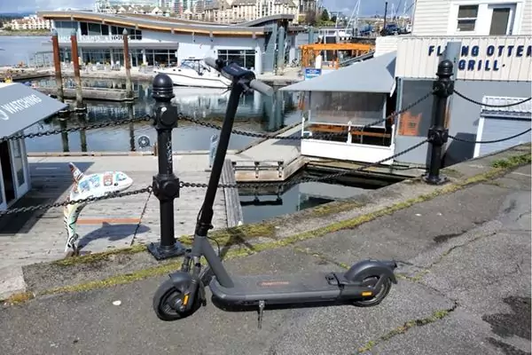 how far can an electric scooter go with full battery